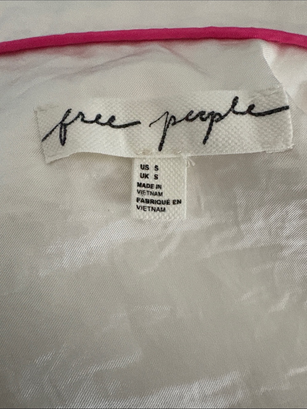 Free People women’s loungewear Size small. 50” in length silk like fabric cream.